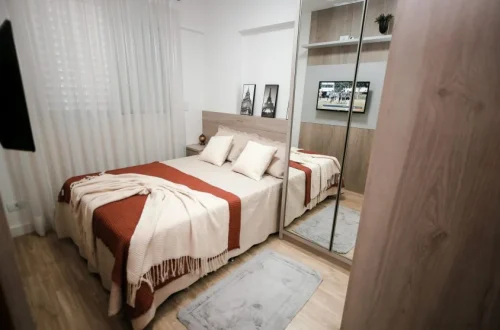 Small bedroom with storage solutions and cozy decor