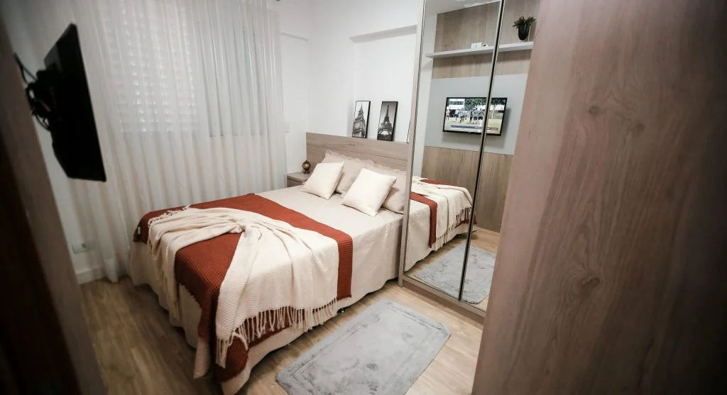 Small bedroom with storage solutions and cozy decor