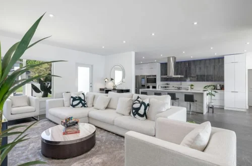 Modern living room with comfortable furniture and natural lighting
