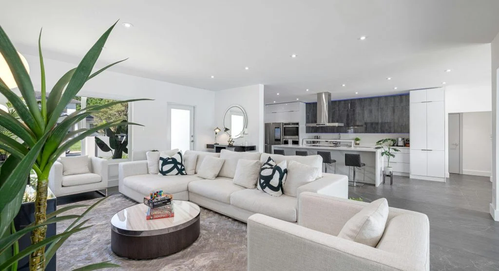 Modern living room with comfortable furniture and natural lighting
