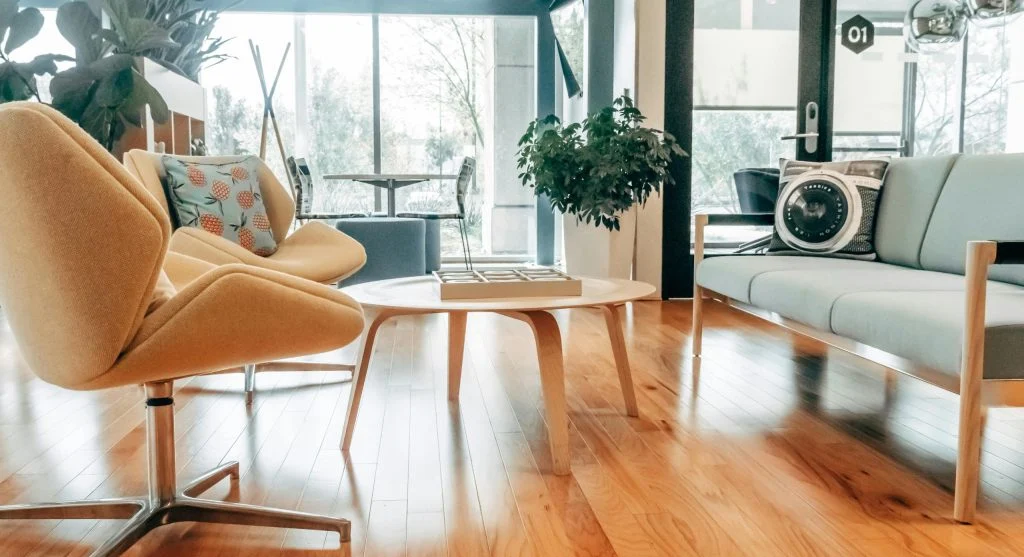 Living room with sofa, armchair, and coffee table